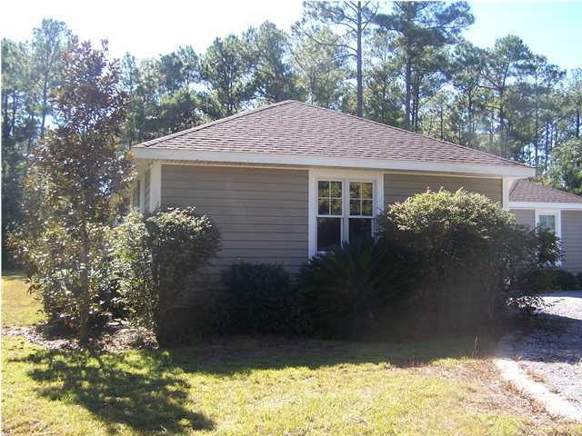 899 Bay Grove Road Freeport, FL 32439 - Photo 8 of 27 a view of a house with a yard