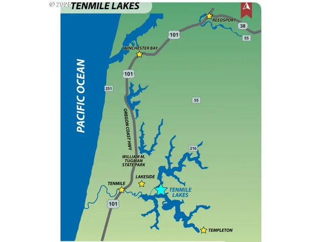 a open area with mountains in the background