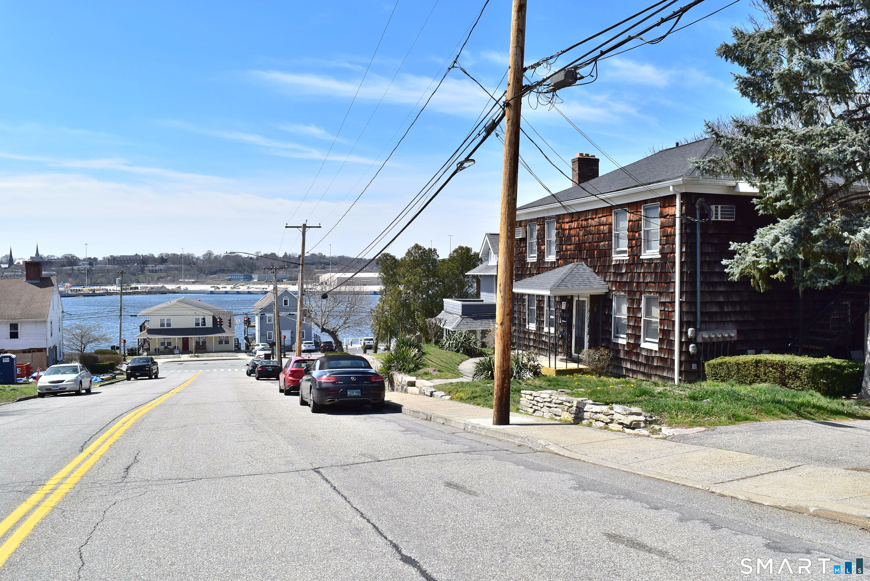 22 Broad Street Groton, CT 06340 - Photo 2 of 14 a car parked in front of a building