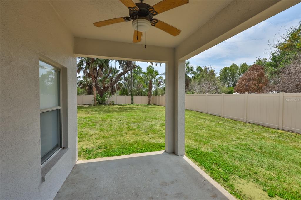 708 Coade Stone Drive Seffner, FL 33584 - Photo 33 of 48 a view of a garden from a windows