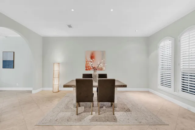 a workspace with furniture and window