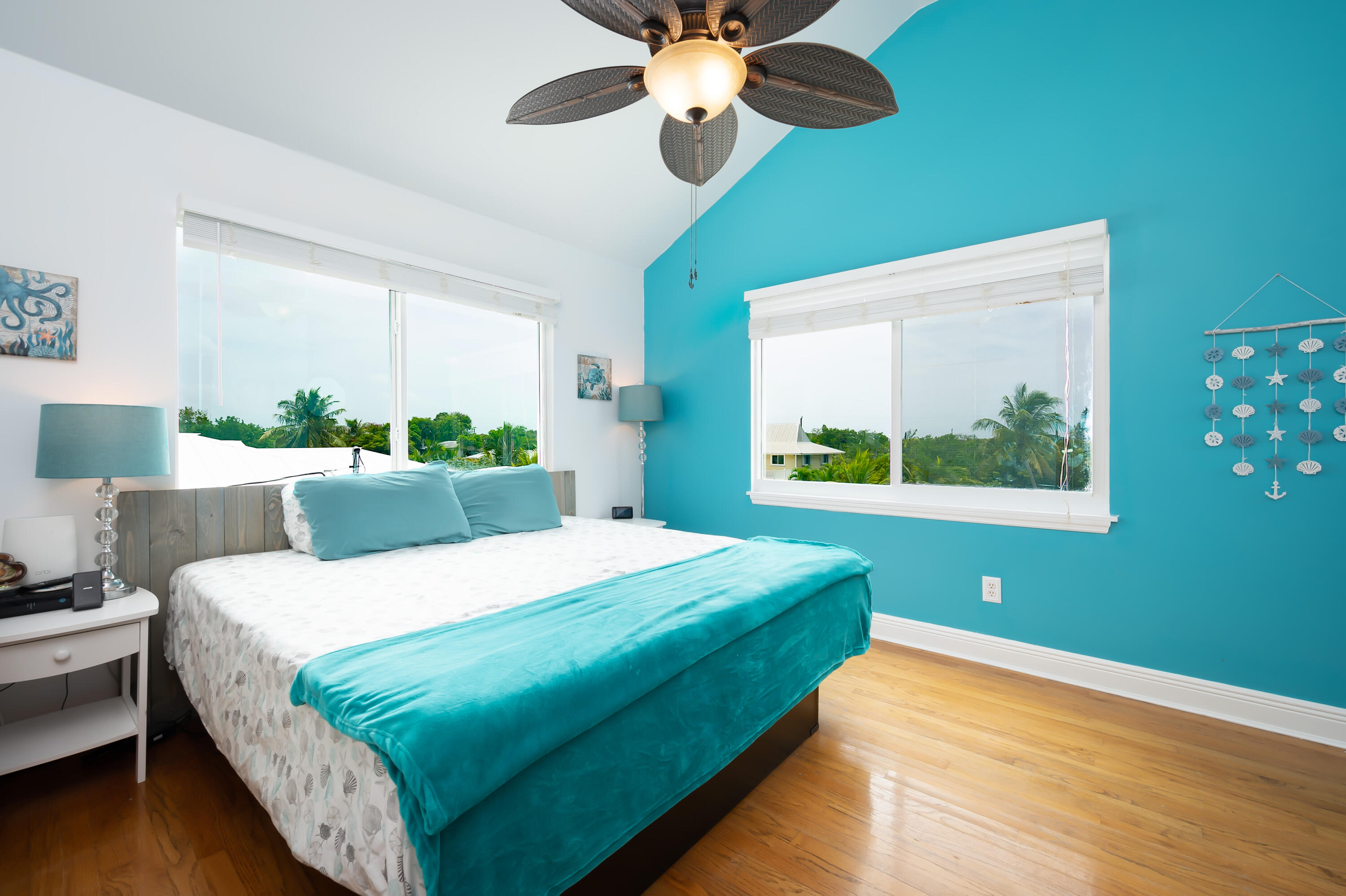 29072 Cedar Drive Big Pine Key, FL 33043 - Photo 11 of 59 a bedroom with a bed and a window