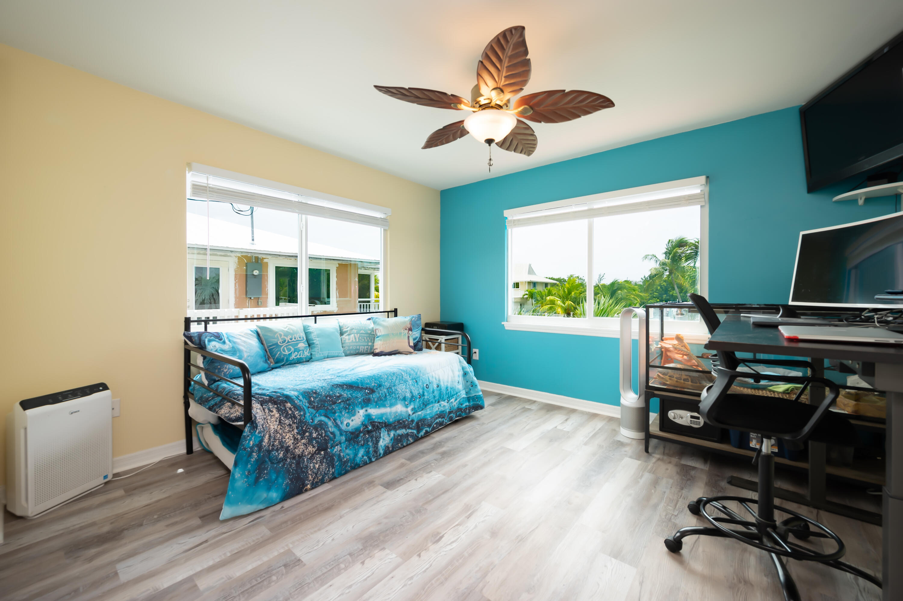 29072 Cedar Drive Big Pine Key, FL 33043 - Photo 14 of 59 a bedroom with a bed and a large window