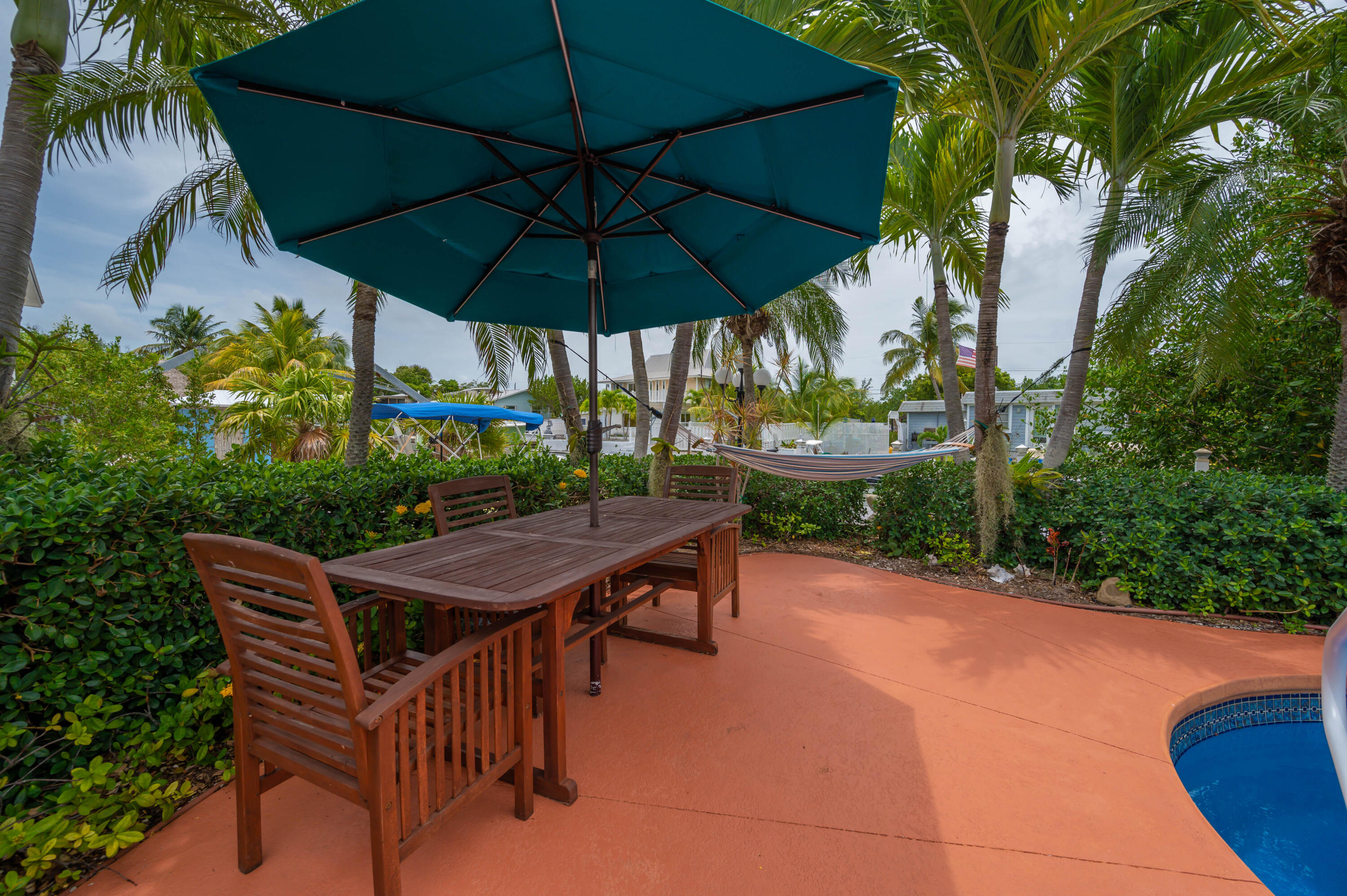 29072 Cedar Drive Big Pine Key, FL 33043 - Photo 24 of 59 a view of an outdoor sitting area with furniture