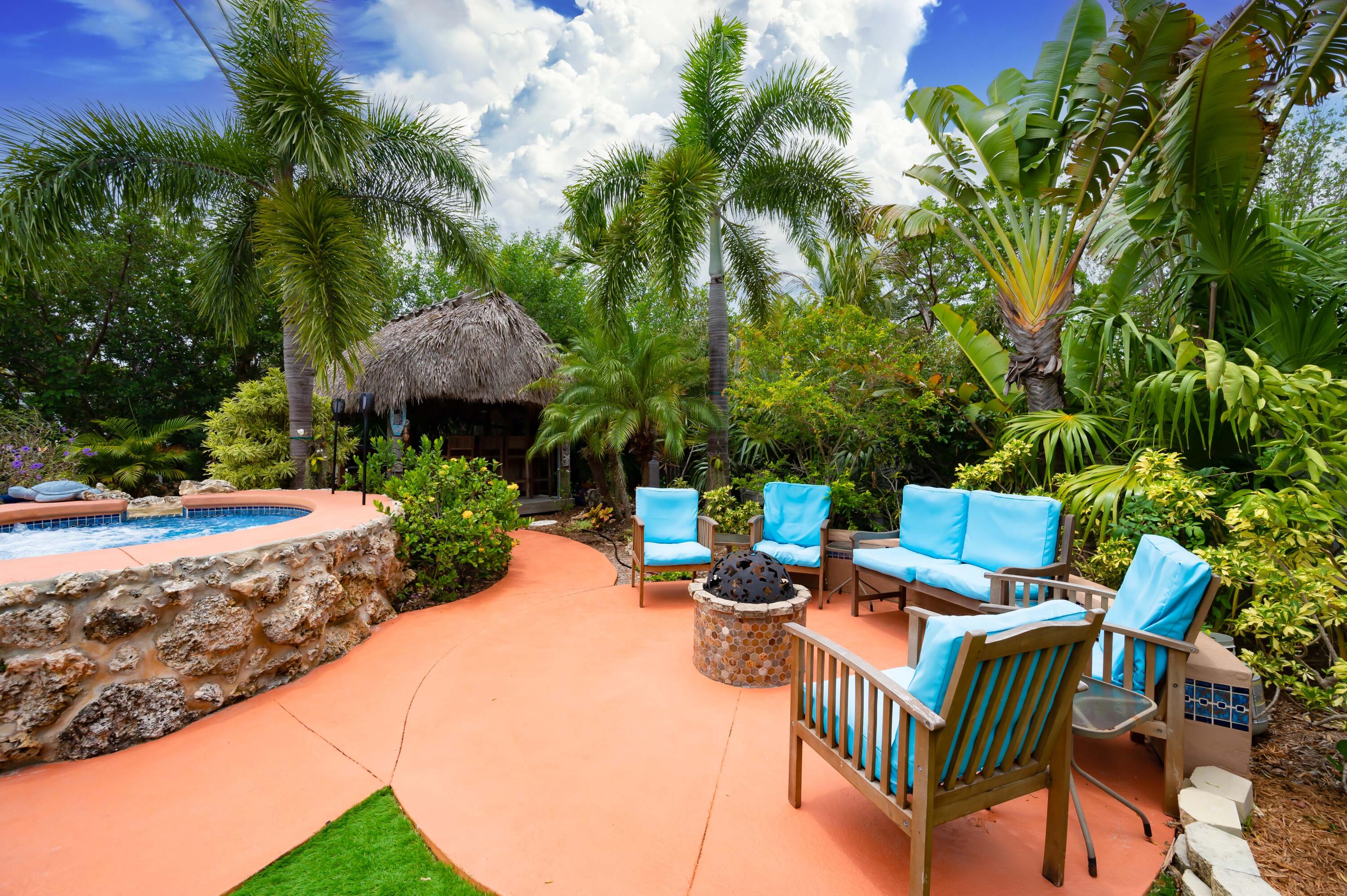 29072 Cedar Drive Big Pine Key, FL 33043 - Photo 25 of 59 a view of a patio with swimming pool and sitting area