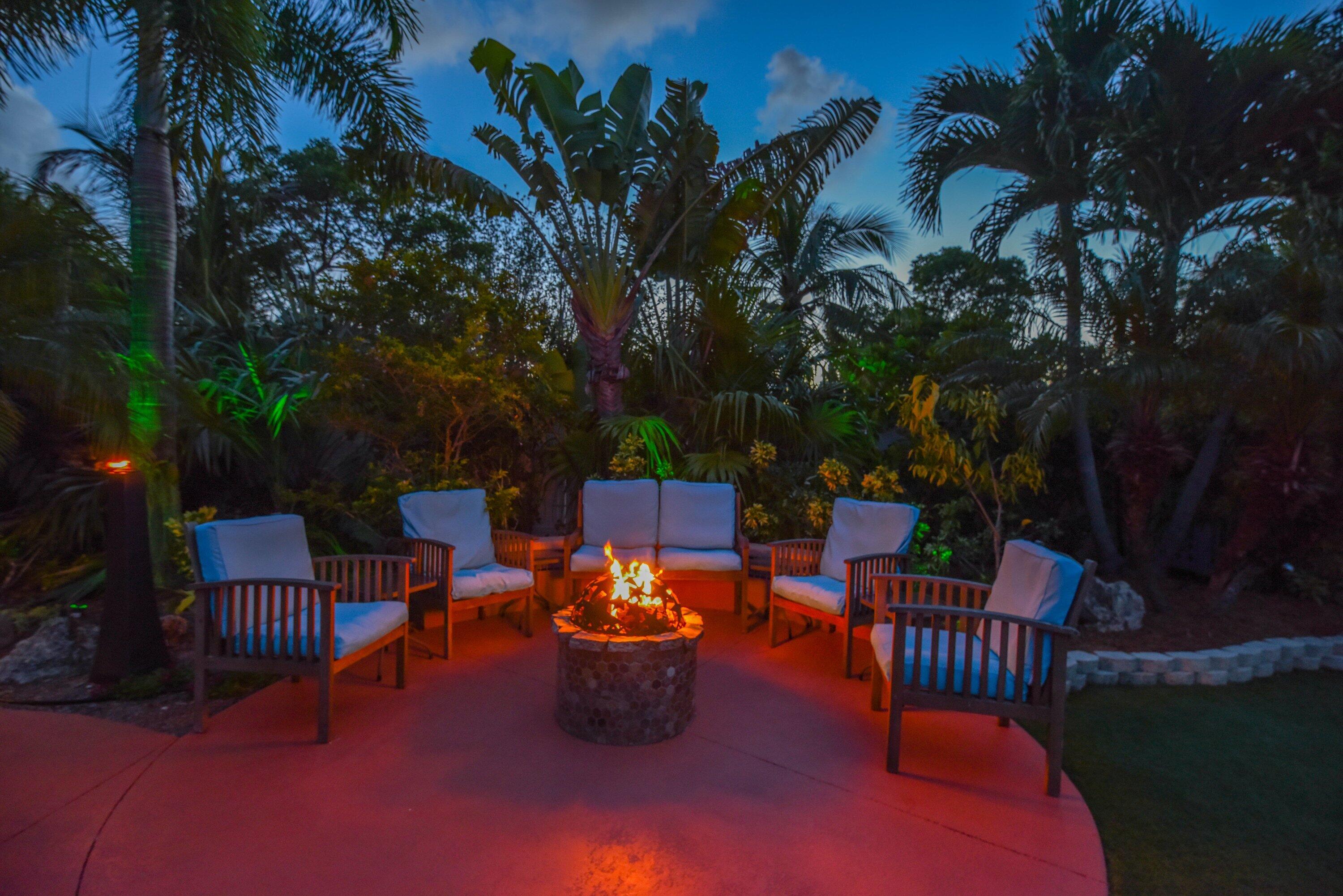 29072 Cedar Drive Big Pine Key, FL 33043 - Photo 29 of 59 a view of a patio with furniture and a fire pit