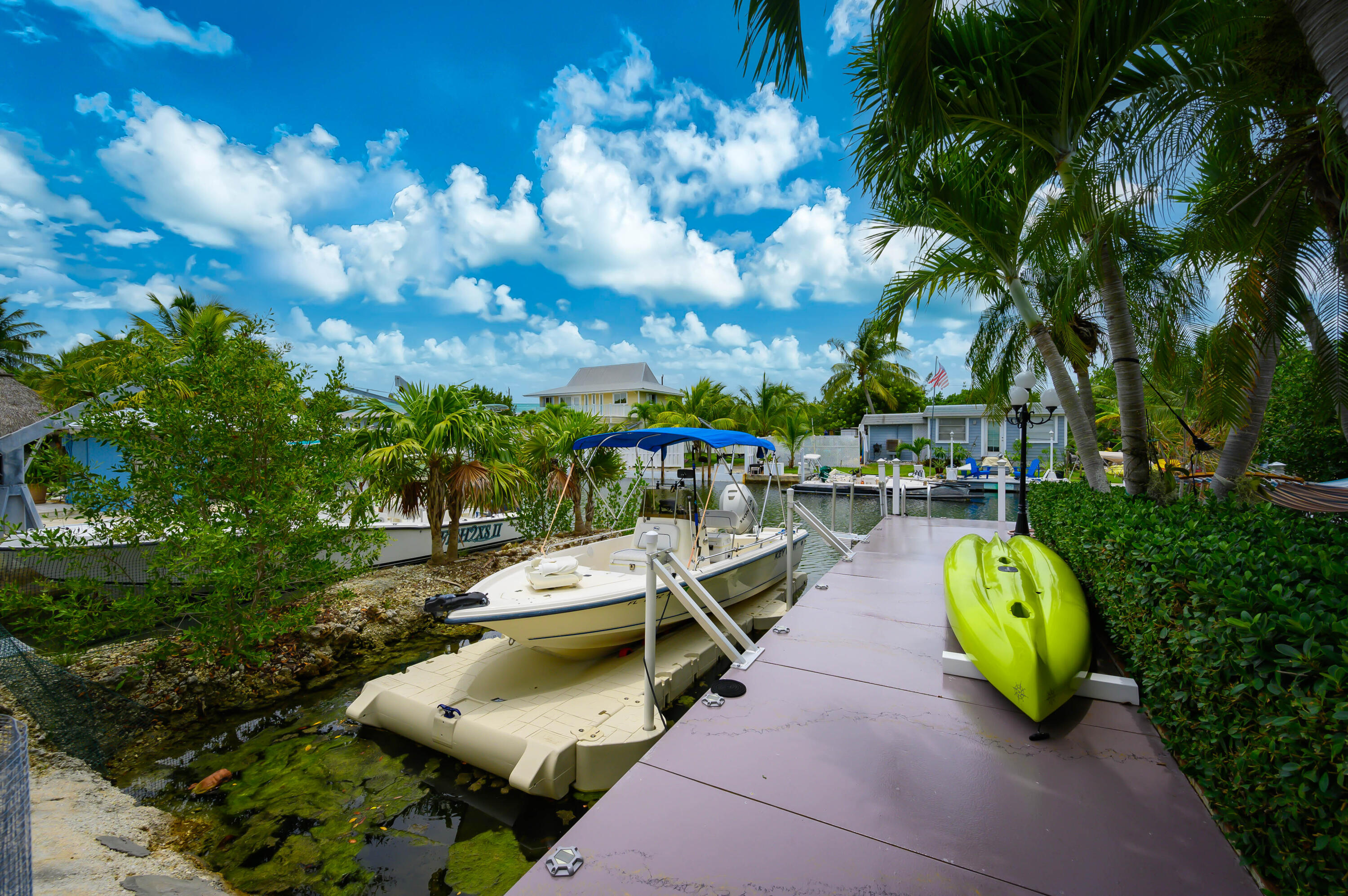 29072 Cedar Drive Big Pine Key, FL 33043 - Photo 4 of 59 a view of swimming pool with outdoor seating and trees