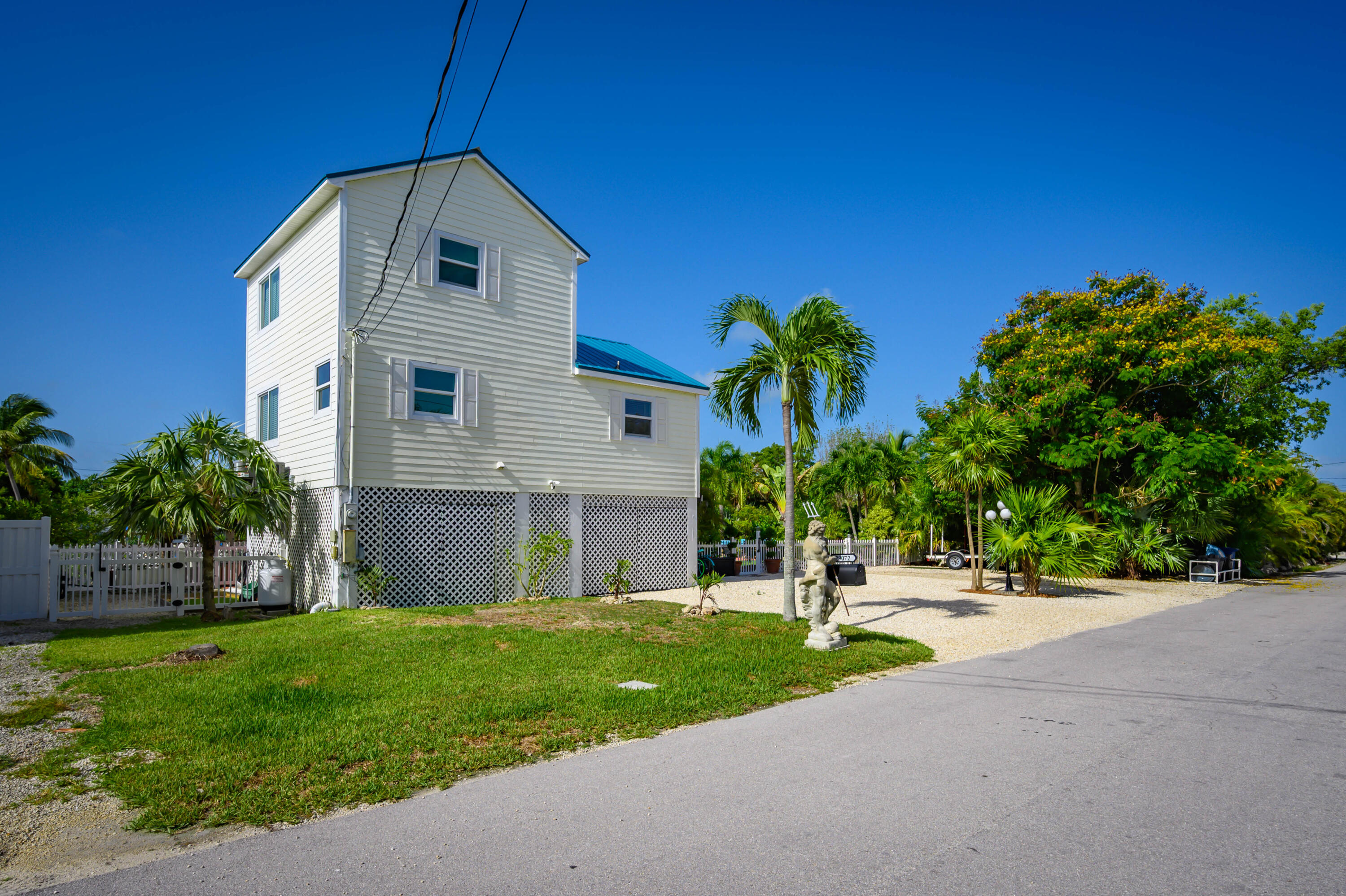 29072 Cedar Drive Big Pine Key, FL 33043 - Photo 51 of 59 a front view of a house with a yard