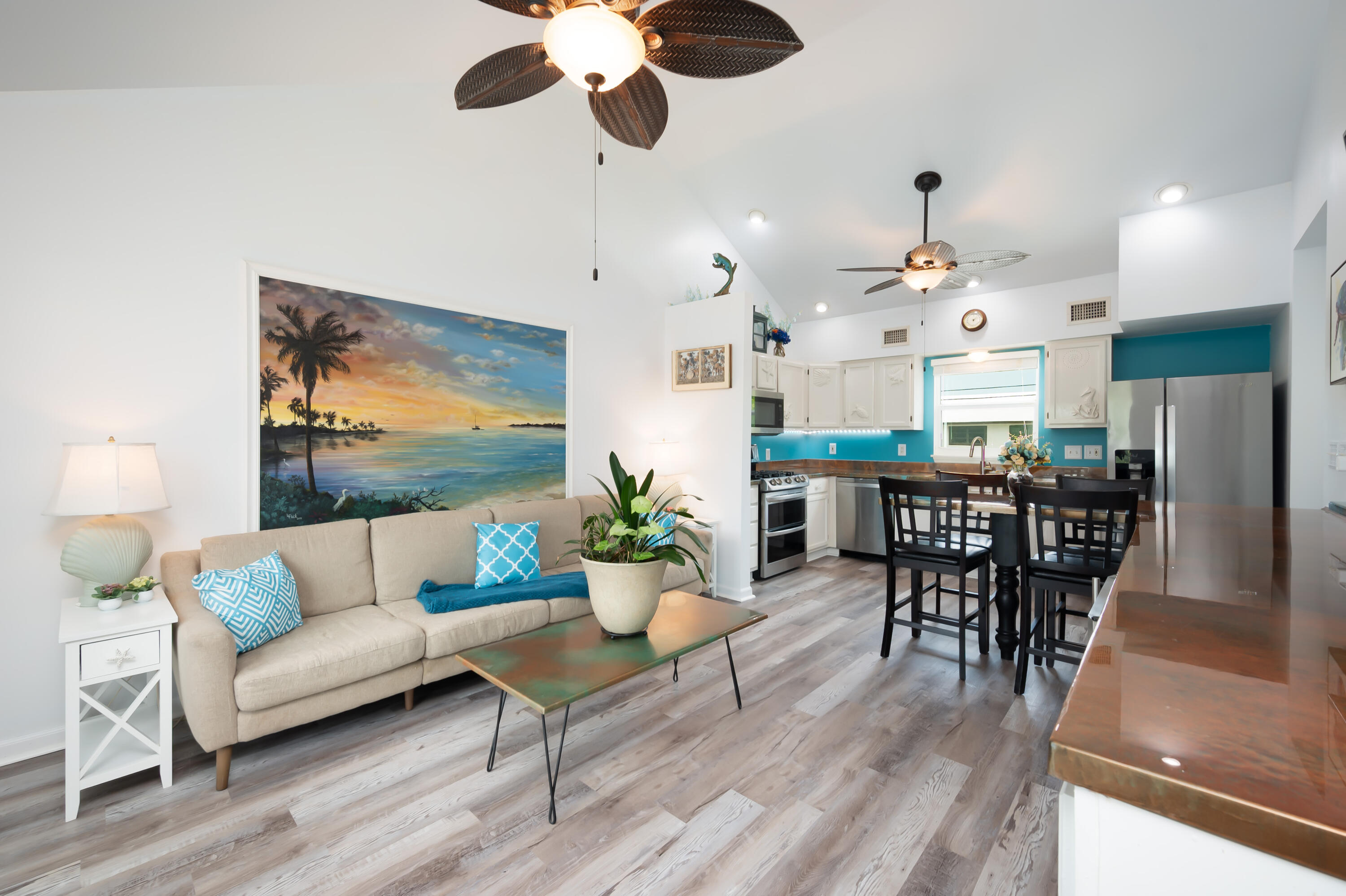 29072 Cedar Drive Big Pine Key, FL 33043 - Photo 7 of 59 a living room with furniture kitchen view and a chandelier