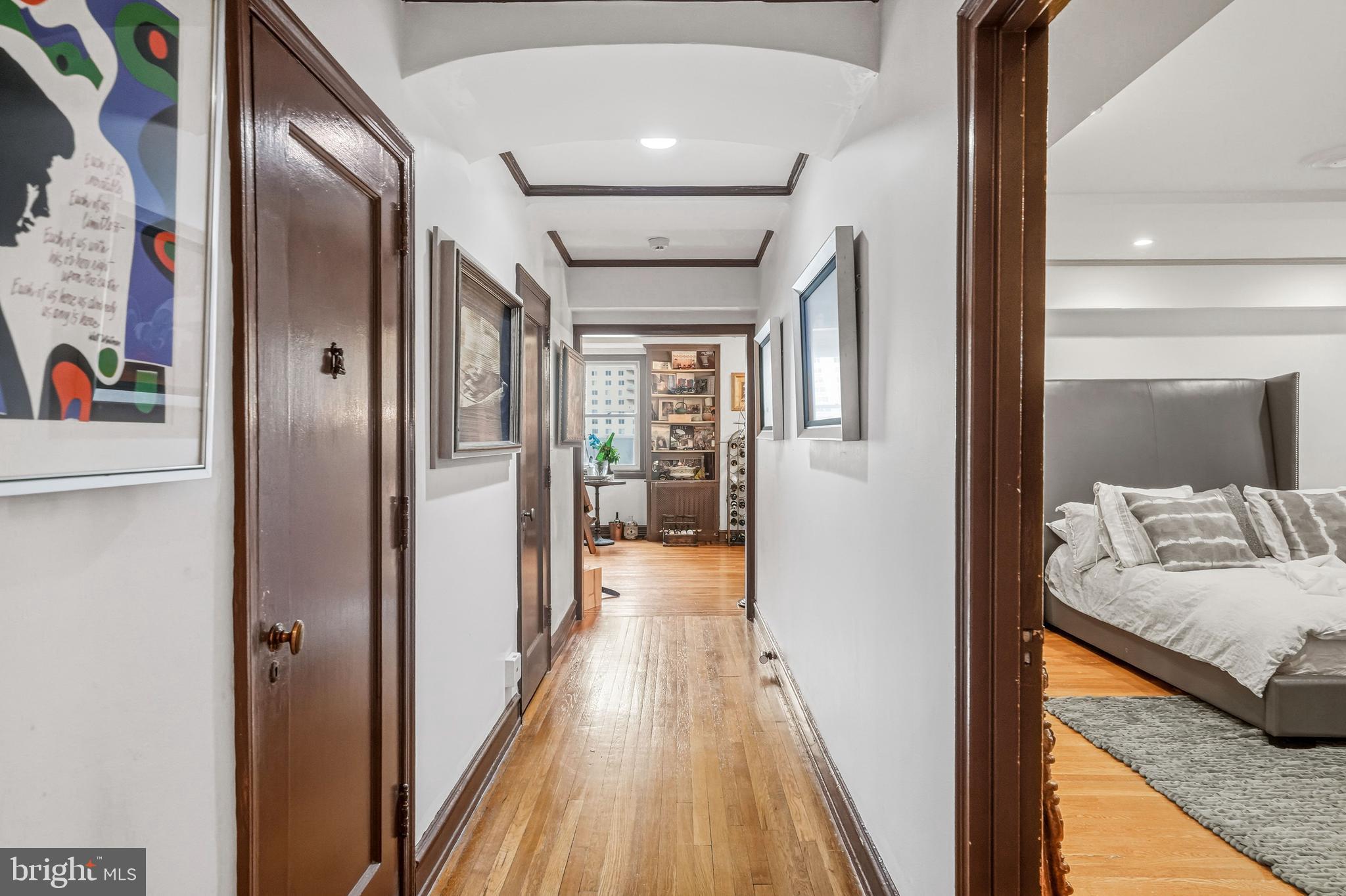 1901 Walnut Street, Unit 6F Philadelphia, PA 19103 - Photo 23 of 32 a view of hallway with wooden floor and furniture