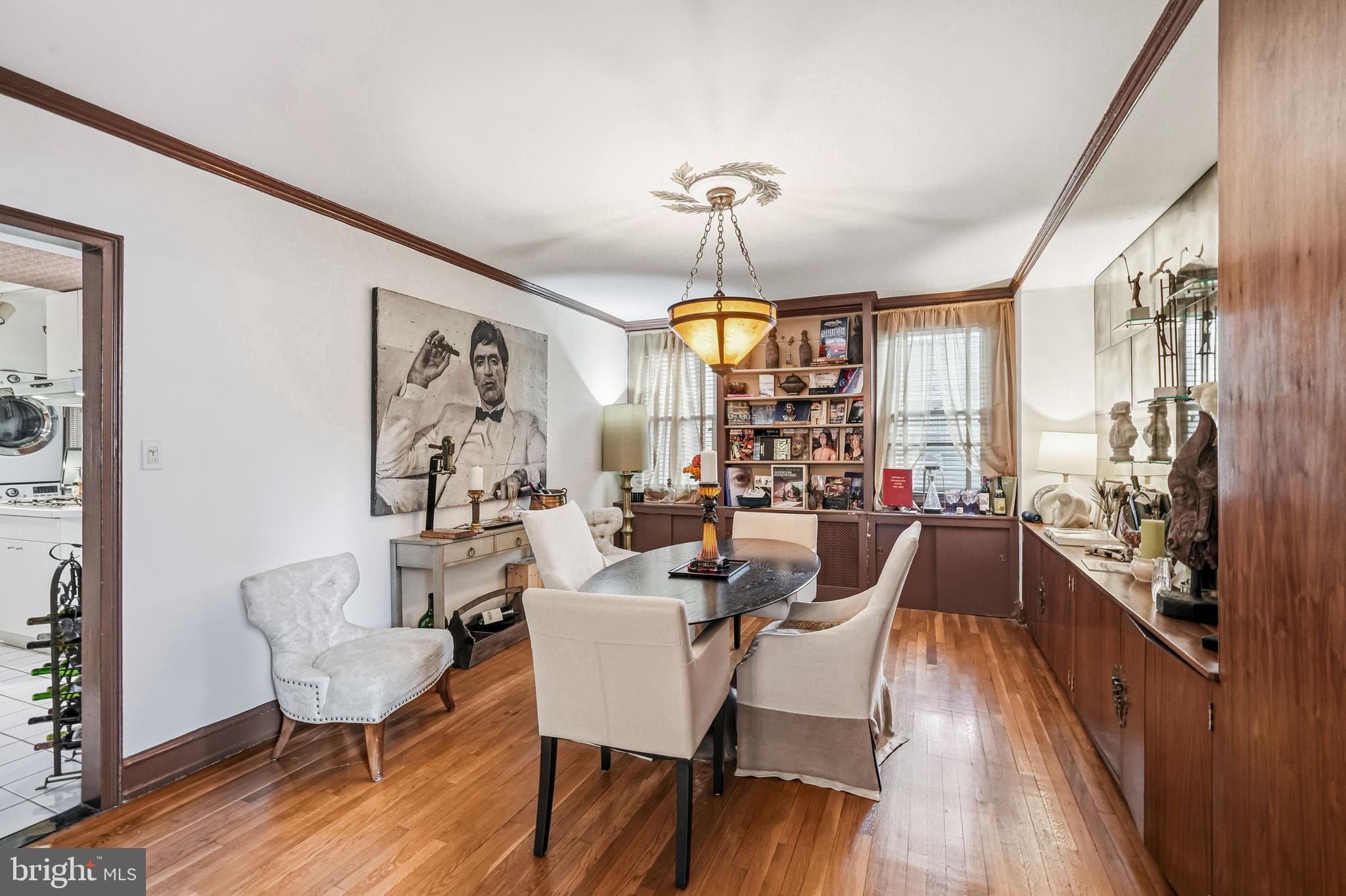 1901 Walnut Street, Unit 6F Philadelphia, PA 19103 - Photo 10 of 32 a view of a dining room with furniture window and wooden floor