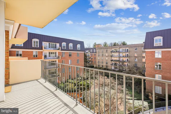 a view of a balcony with city view