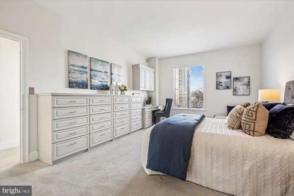 a bedroom with a bed and a closet
