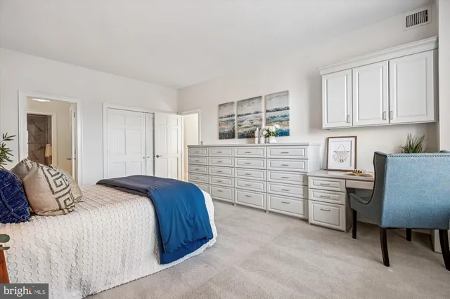 a bedroom with a bed and furniture