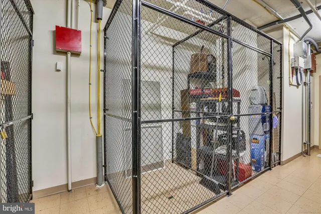 a view of parking garage with cars parked