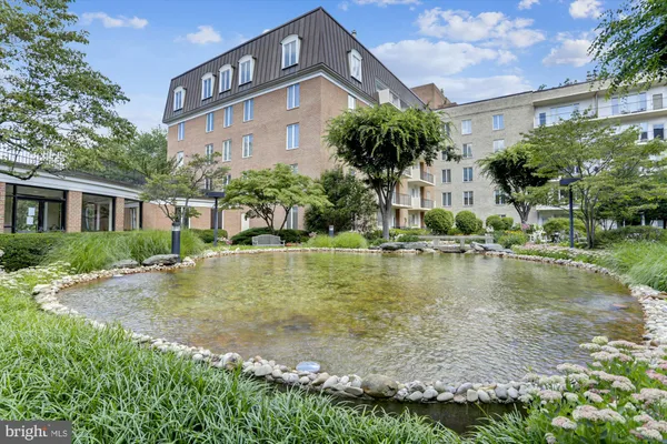 a front view of a building and a yard