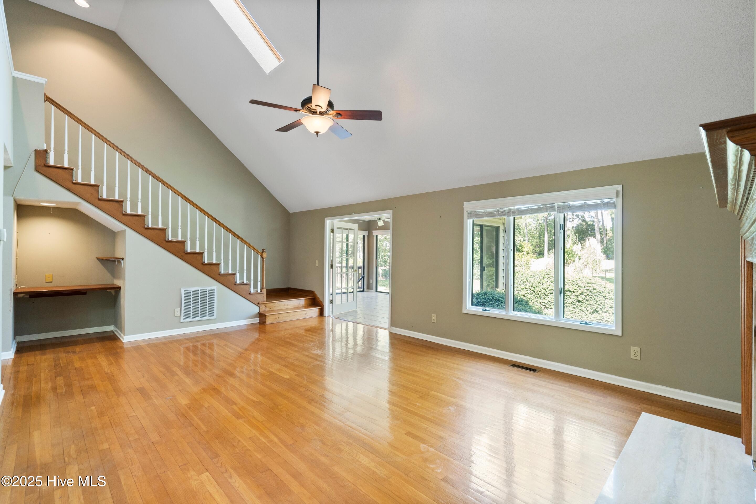 153 Olde Point Road Hampstead, NC 28443 - Photo 4 of 21 living room stairs