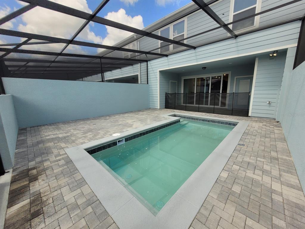 1264 Blue Is Drive Clermont, FL 34714 - Photo 23 of 56 a view of a backyard of the house