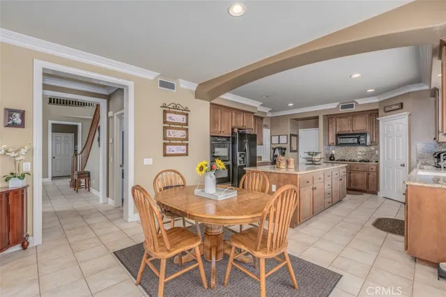 a view of a dining room kitchen and a window