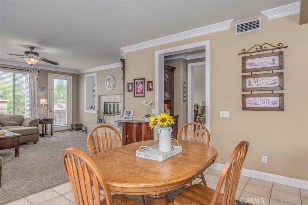 980 Nicholas Place Corona, CA 92882 - Photo 14 of 46 a dining room with furniture and wooden floor