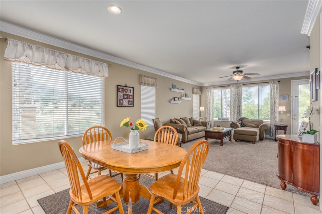 980 Nicholas Place Corona, CA 92882 - Photo 15 of 46 a view of a dining room with furniture window and outside view