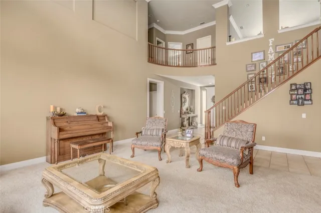 a work room with furniture and a potted plant