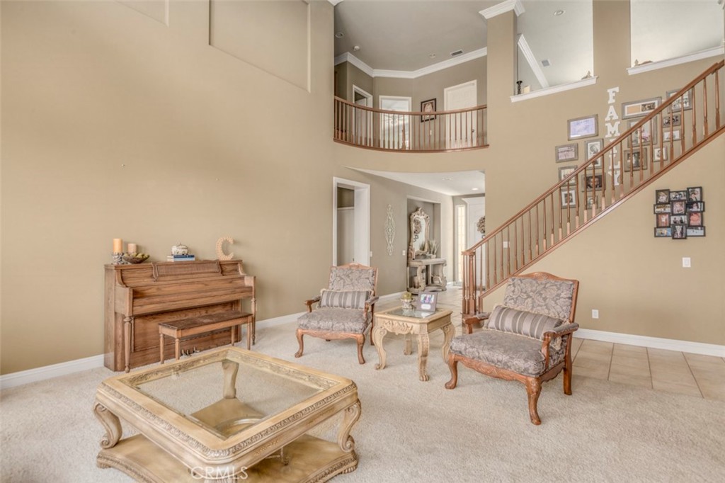 980 Nicholas Place Corona, CA 92882 - Photo 22 of 46 a living room with furniture and a wooden floor