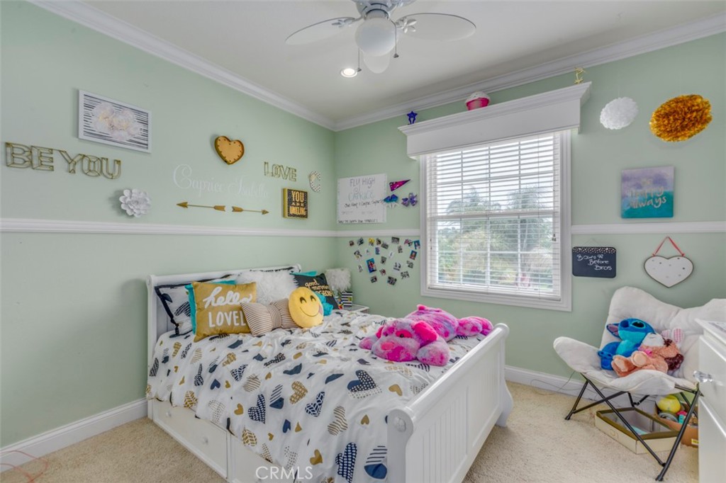 980 Nicholas Place Corona, CA 92882 - Photo 39 of 46 a bedroom with a bed and window