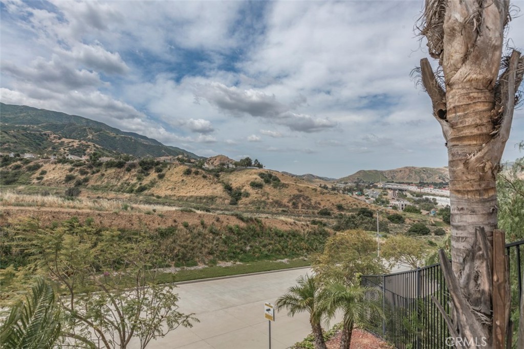 980 Nicholas Place Corona, CA 92882 - Photo 4 of 46 a view of a lake with mountains in the background