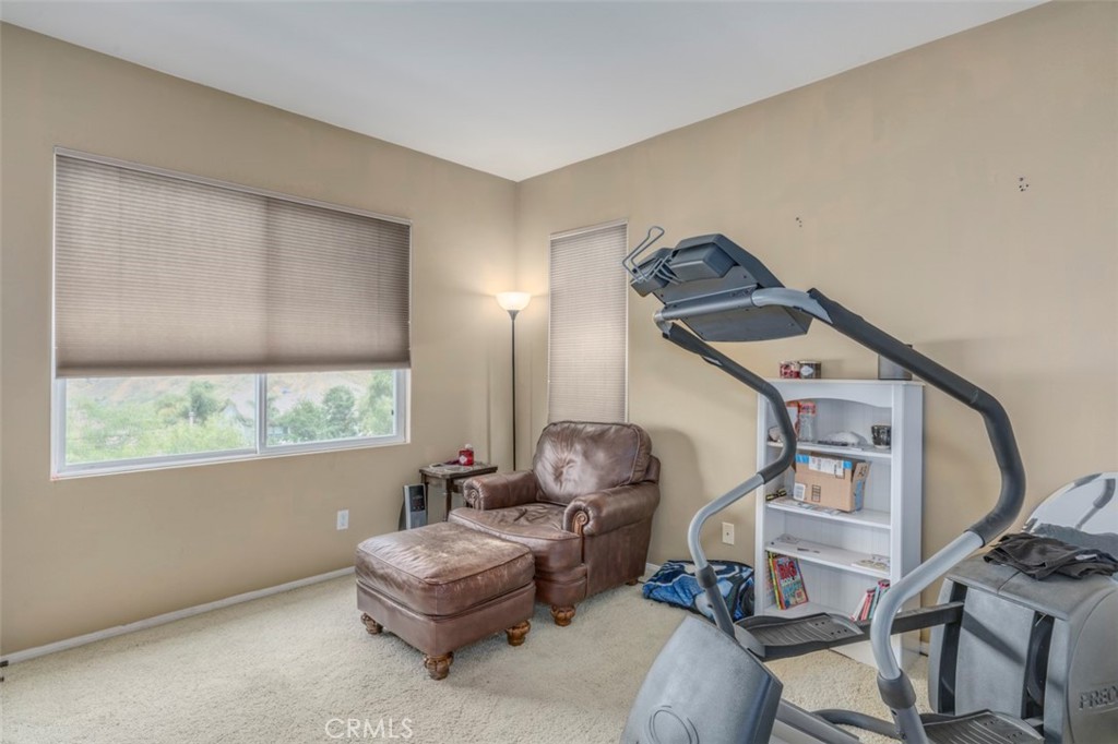 980 Nicholas Place Corona, CA 92882 - Photo 41 of 46 a room with furniture and a window