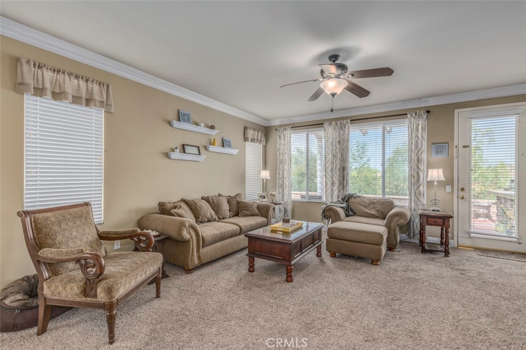 980 Nicholas Place Corona, CA 92882 - Photo 7 of 46 a living room with furniture and a large window