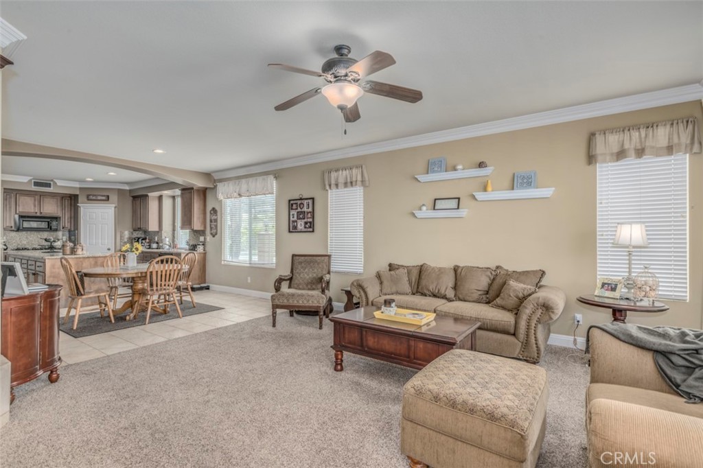 980 Nicholas Place Corona, CA 92882 - Photo 9 of 46 a living room with furniture and a large window