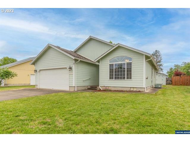 3014 View Lane Lebanon, OR 97355 - Photo 1 of 29 a house with a yard