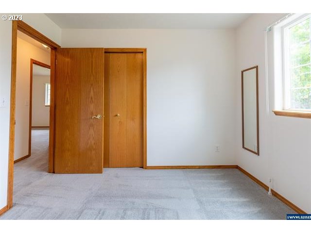 3014 View Lane Lebanon, OR 97355 - Photo 14 of 29 a view of an empty room with window and bathroom