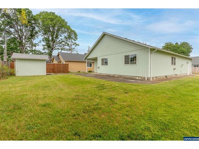 3014 View Lane Lebanon, OR 97355 - Photo 19 of 29 a view of a house with a yard