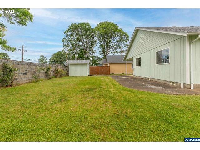 3014 View Lane Lebanon, OR 97355 - Photo 2 of 29 a view of an house with backyard space and balcony