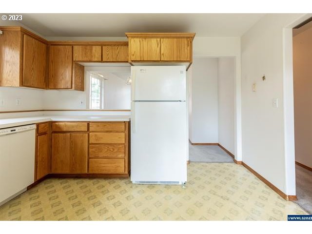 3014 View Lane Lebanon, OR 97355 - Photo 27 of 29 a view of a kitchen with wooden floor