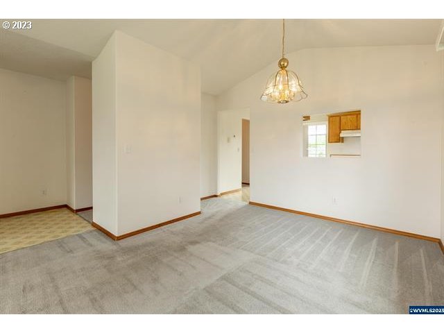3014 View Lane Lebanon, OR 97355 - Photo 3 of 29 a view of an empty room with window