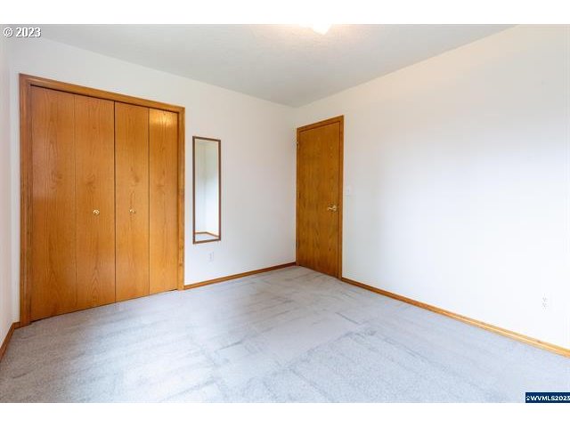 3014 View Lane Lebanon, OR 97355 - Photo 8 of 29 a view of an empty room with a window