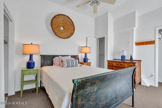 157 Beach Front Manasquan, NJ 08736 - Photo 30 of 47 a bedroom with bed and a table