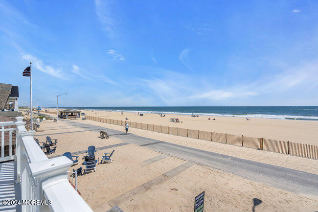 157 Beach Front Manasquan, NJ 08736 - Photo 37 of 47 a view of a swimming pool and an outdoor seating