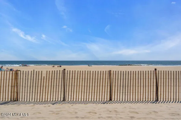 a city street lined with buildings and cars