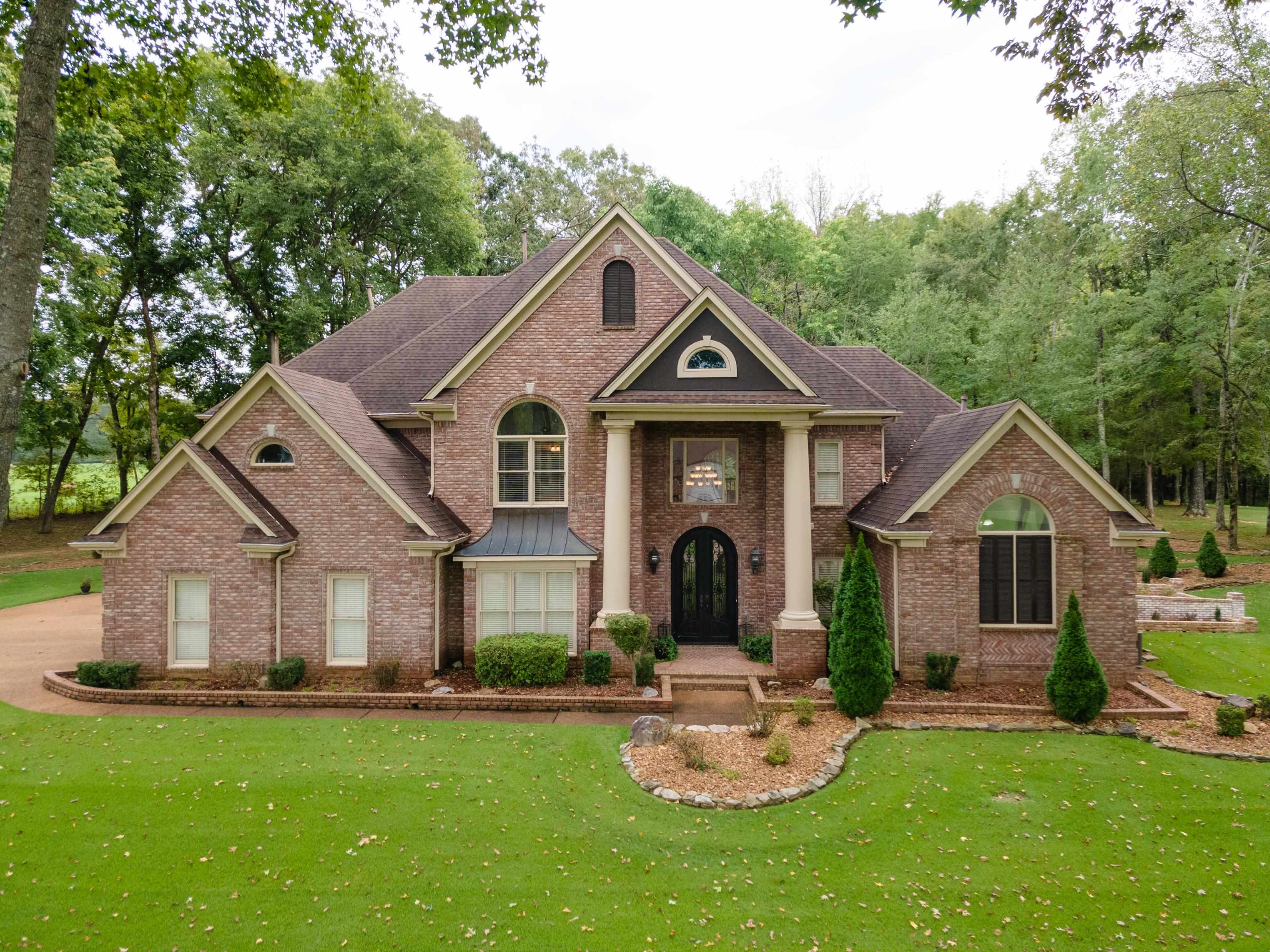 11241 Latting Road Eads, TN 38028 - Photo 1 of 31 a front view of house with yard and green space