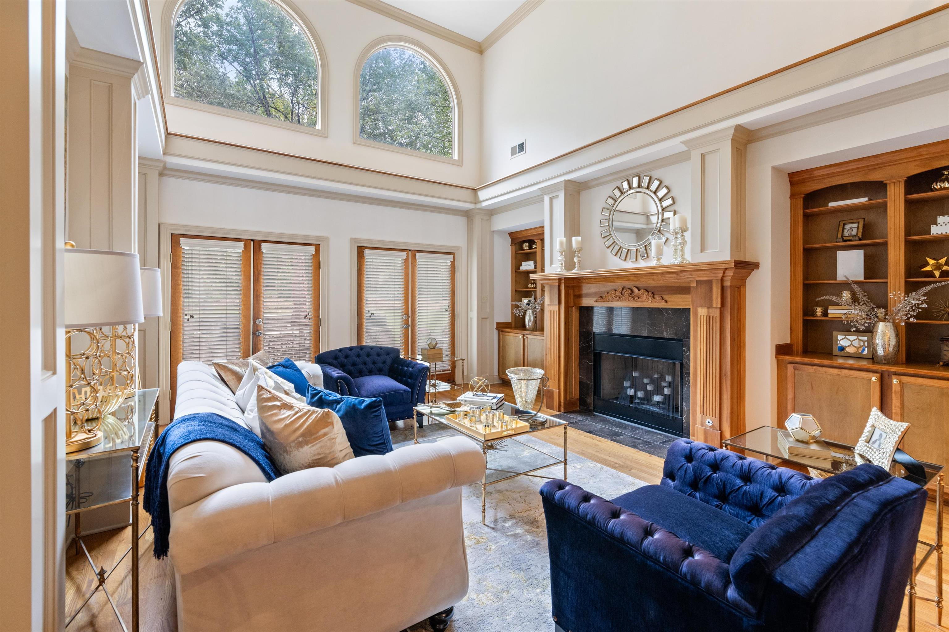 11241 Latting Road Eads, TN 38028 - Photo 15 of 31 a living room with furniture a fireplace and a large window