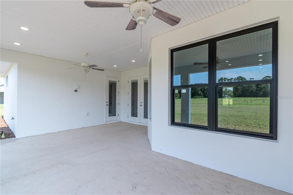 2073 Northwest 79th Loop Ocala, FL 34475 - Photo 45 of 75 a view of a building stairs and a floor to ceiling window