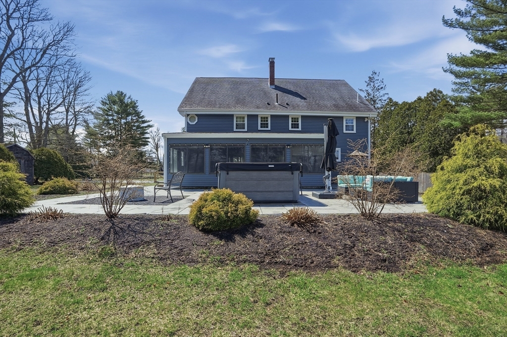 61 Main Street Hanover, MA 02339 - Photo 34 of 38 a front view of a house with garden