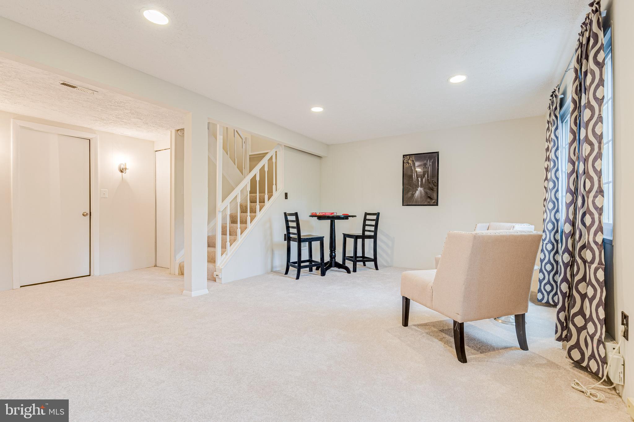 11500 Ivy Bush Court Reston, VA 20191 - Photo 21 of 33 Wall lights on far wall add charm.