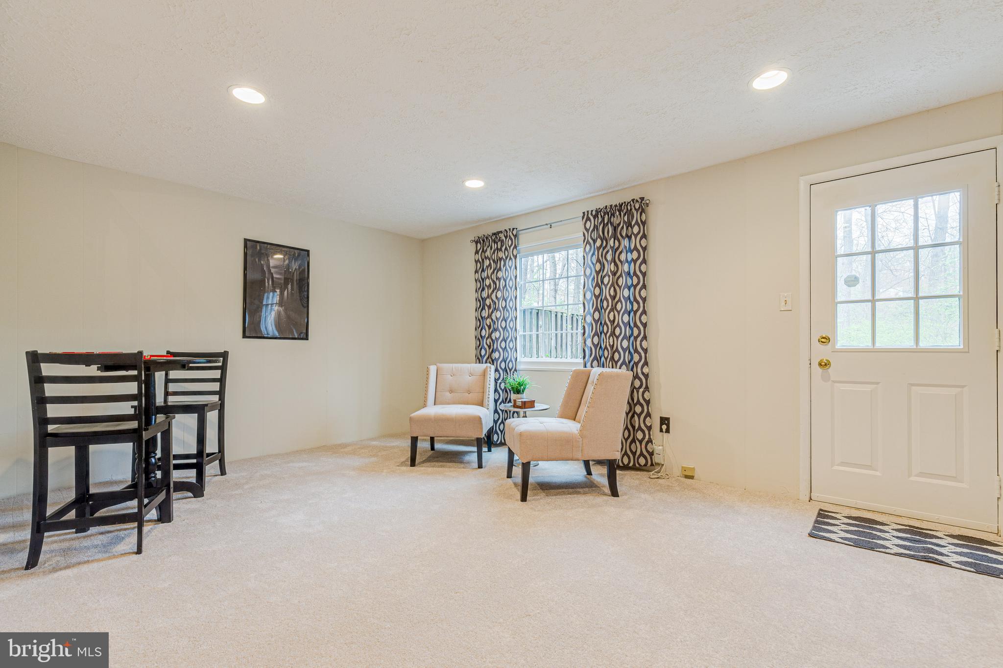 11500 Ivy Bush Court Reston, VA 20191 - Photo 25 of 33 New carpet in lower level with recessed lights.
