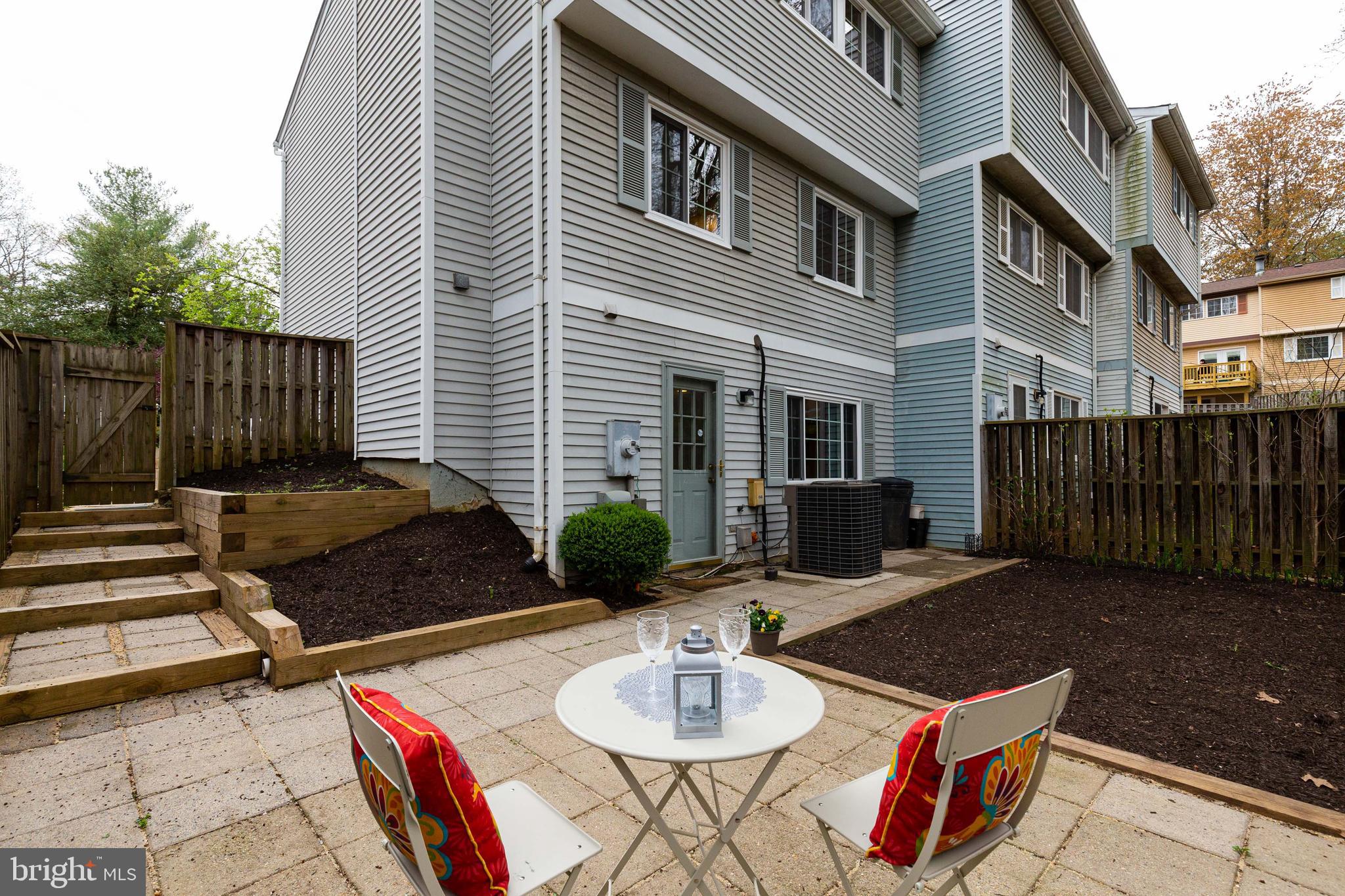 11500 Ivy Bush Court Reston, VA 20191 - Photo 27 of 33 Paver patio with mulched beds.