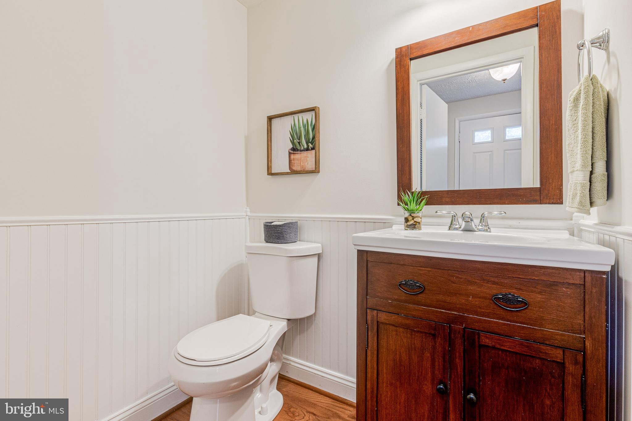 11500 Ivy Bush Court Reston, VA 20191 - Photo 5 of 33 Main level half bath with beadboard paneling.